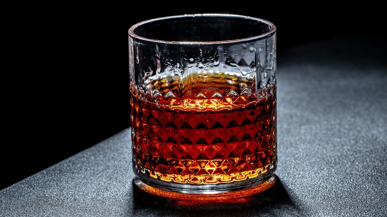 neat brandy in rocks glass