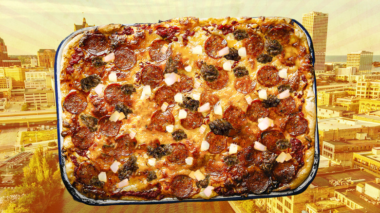 Milwaukee-style pizza against city background