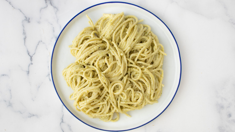 sauced spaghetti portion on plate